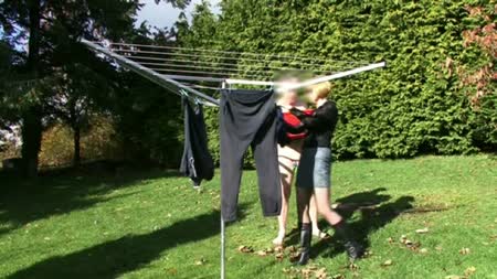 Washday - When it comes to washday how else do you **** your washing out yes by using a naked slave to hold it and of course where would the pegs be?