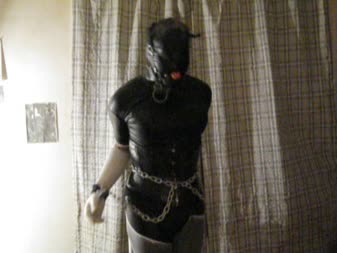 Zentai Bound N Gagged - Vanessa fetish is bound and gagged wearing her zentai suit, corset, boots, and gloves